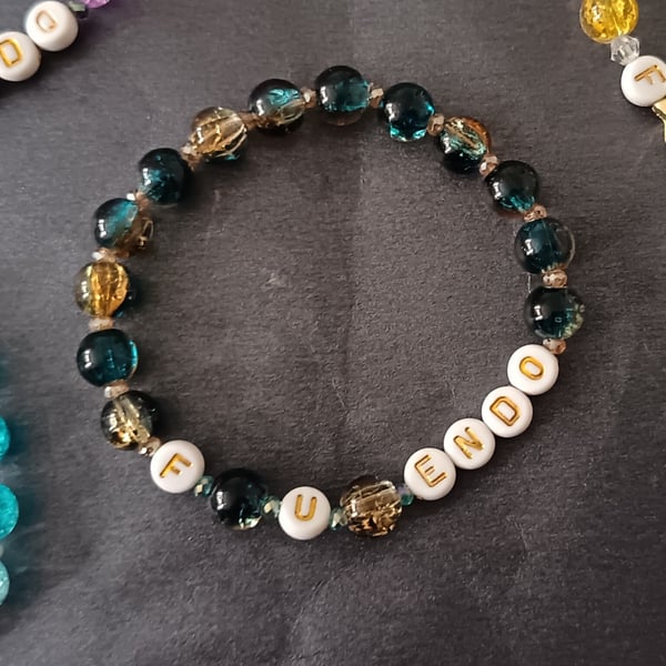 Elasticated blue beaded endometriosis bracelet