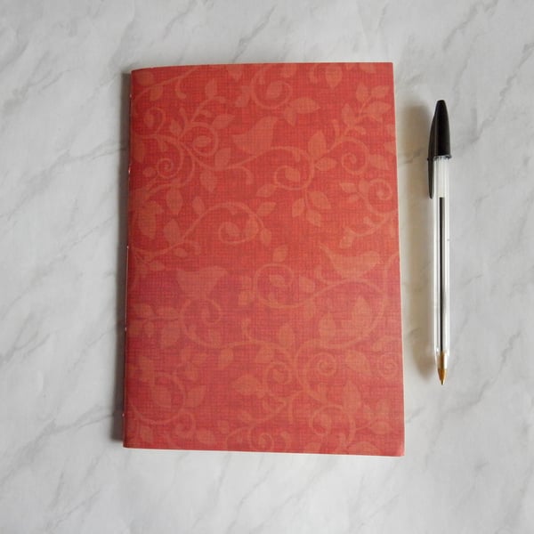 Pearly Birds Notebook, A5 Lined pages, coral birds cover.