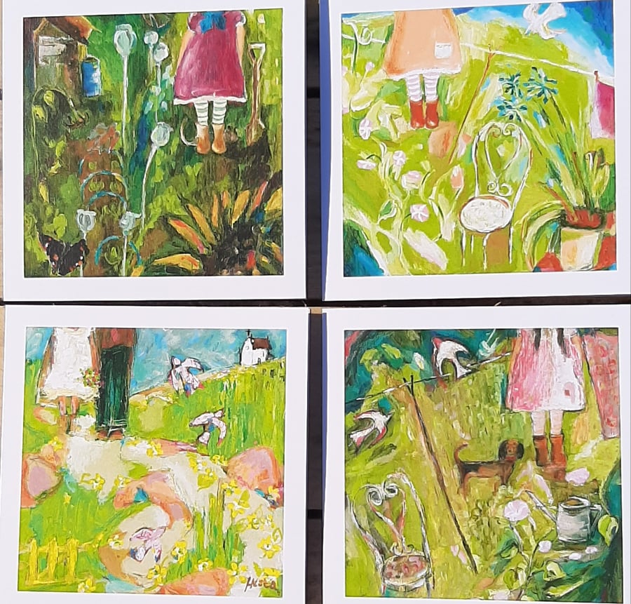 Four blank cards .gardening themed. 