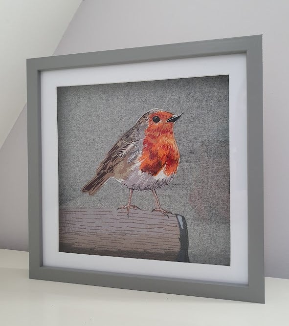 Robin on Spade - framed original embroidered artwork, fabric applique