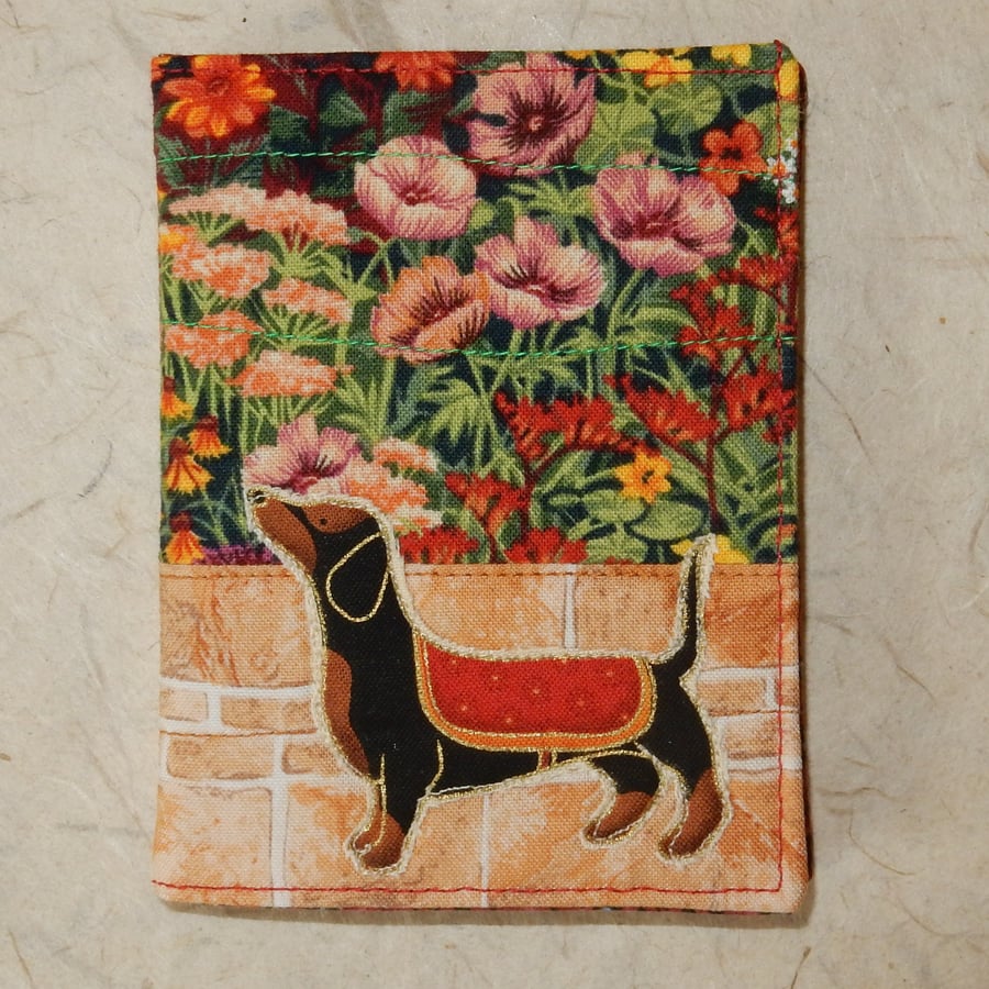 Needle case - dachshund in garden