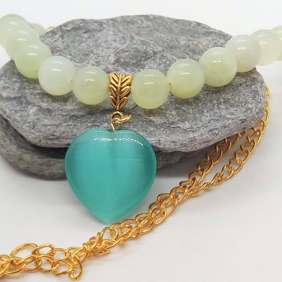 Teal Glass Heart Pendant on a Jade Bead and Gold Chain Necklace