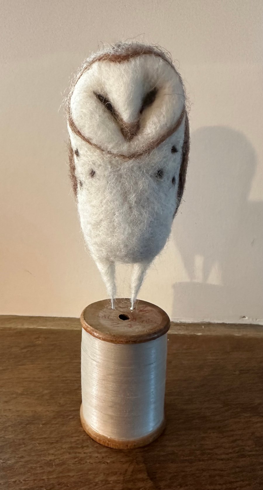 Owl on a bobbin 