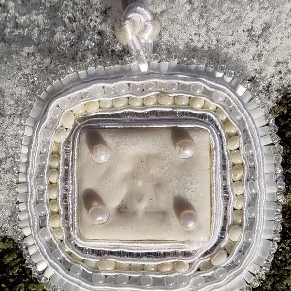 “White Amulet – Porcelain Pendant with Letter A, Soutache & Glass Beads