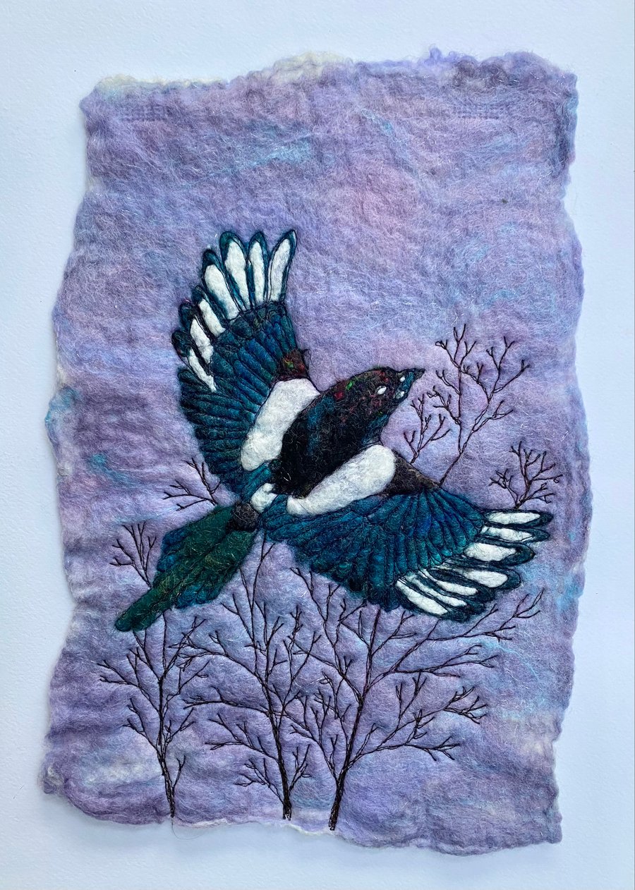 Magpie flying original Artwork. Wet felting with free motion embroidery. 