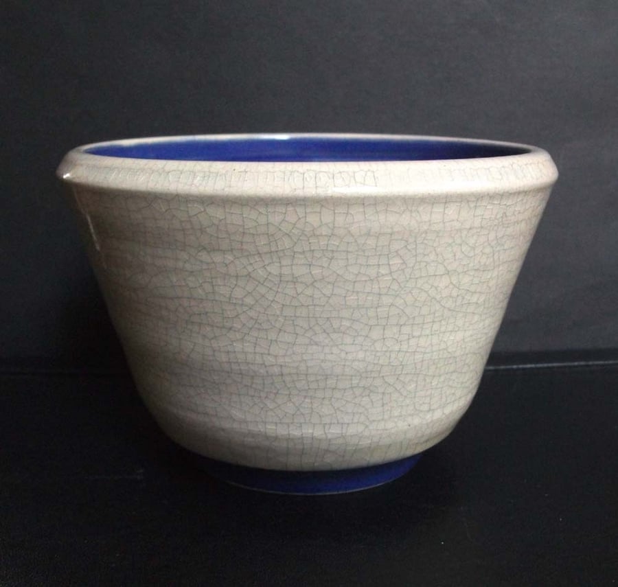 Small ceramic hand thrown crackle bowl with bright interior