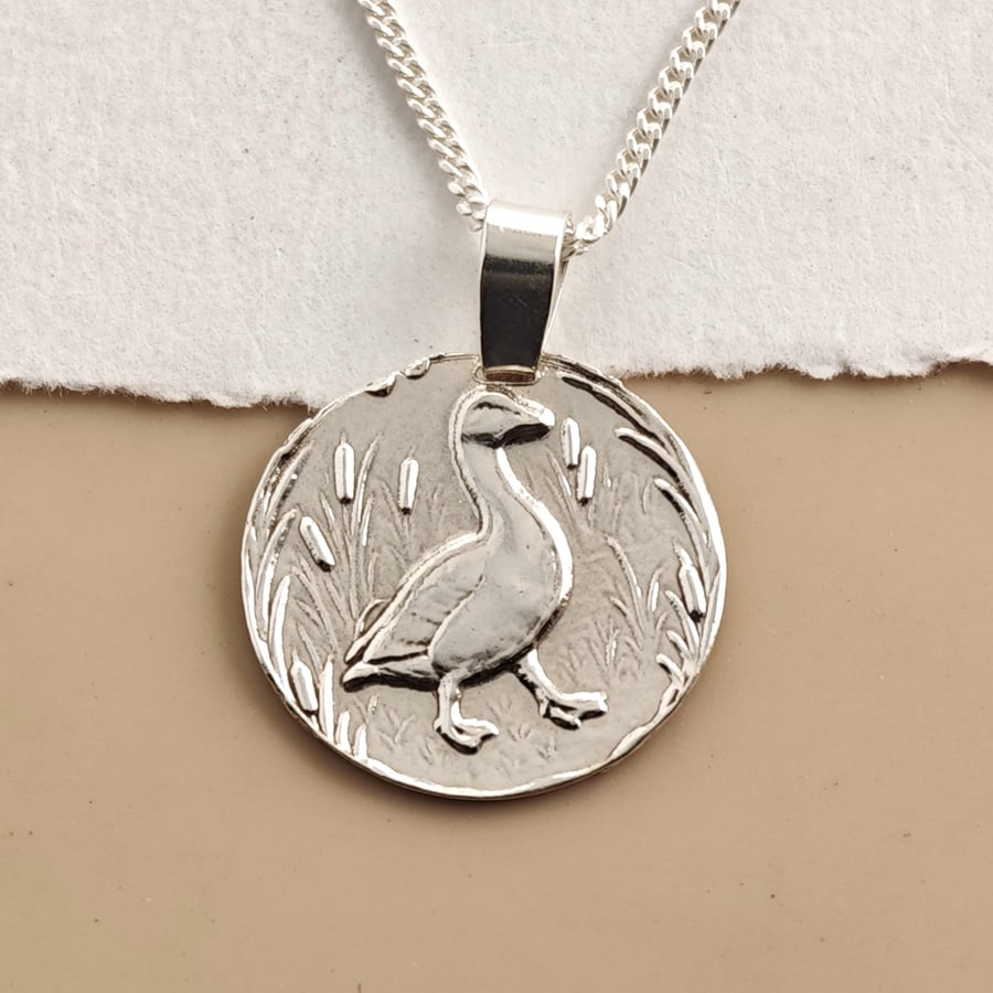 Image of Goose Engraved Sterling Silver Coin Necklace