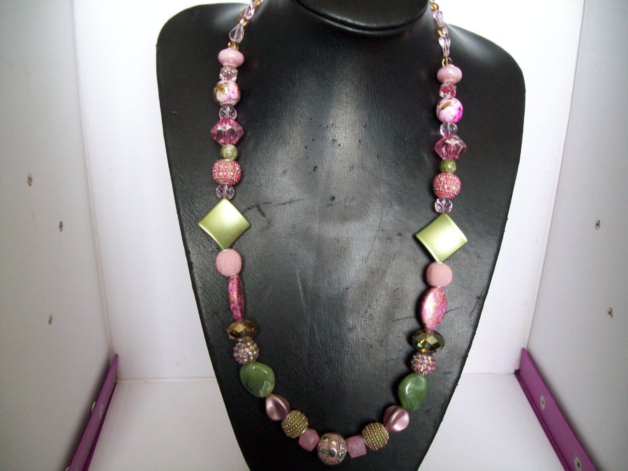 Botanicals necklace with mixed purple and green glass and resin and clay beads