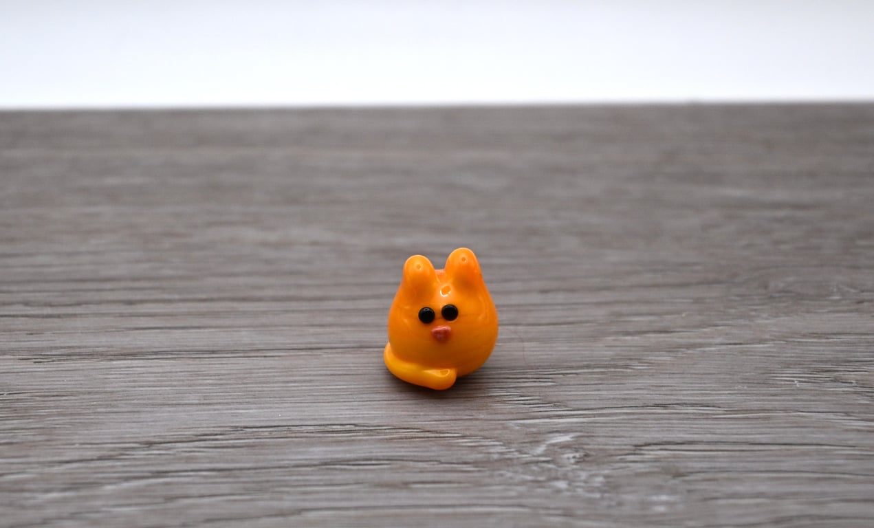 small orange glass cat keepsake figure