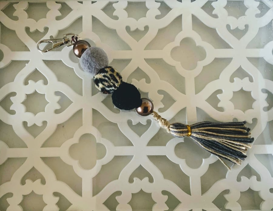 Pom Pom bag charm with tassel
