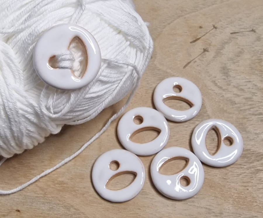 White Ceramic Buttons. Sold individually.