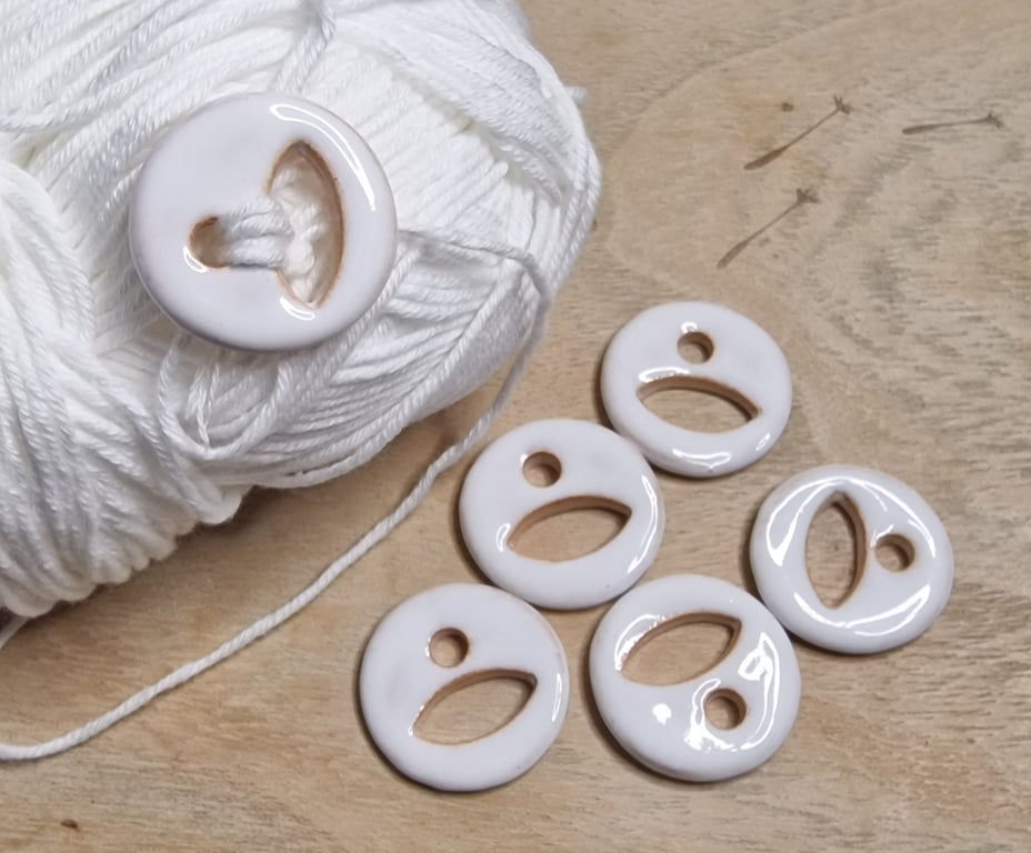 White Ceramic Buttons. Sold individually.