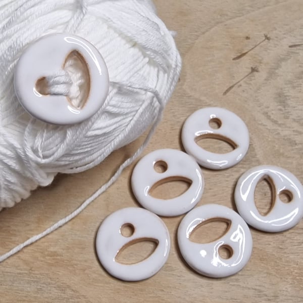 White Ceramic Buttons. Sold individually.