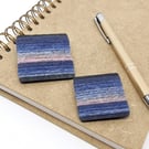Square wool wrapped brooch in blues and pink