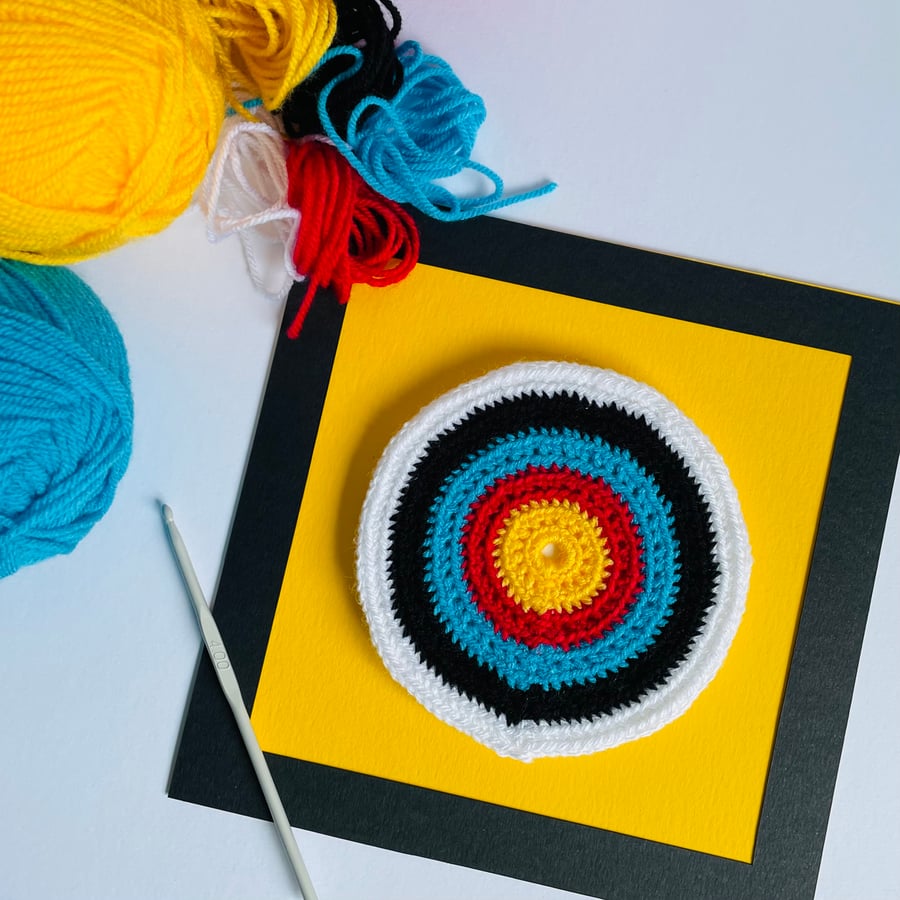 Framed Crochet Wall Artwork, Small Crochet Target, Yellow Background. 