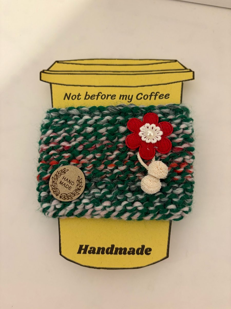 Christmas red ponsettia flower knitted cup cosy. 