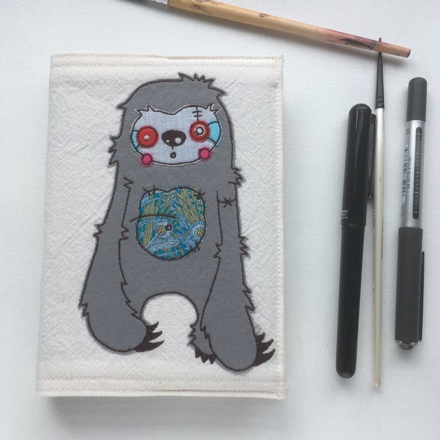 applique freehand embroidered zombie sloth A6 notebook 