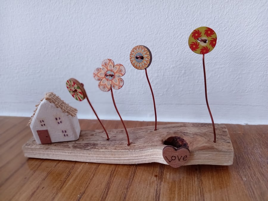Miniature house and button garden