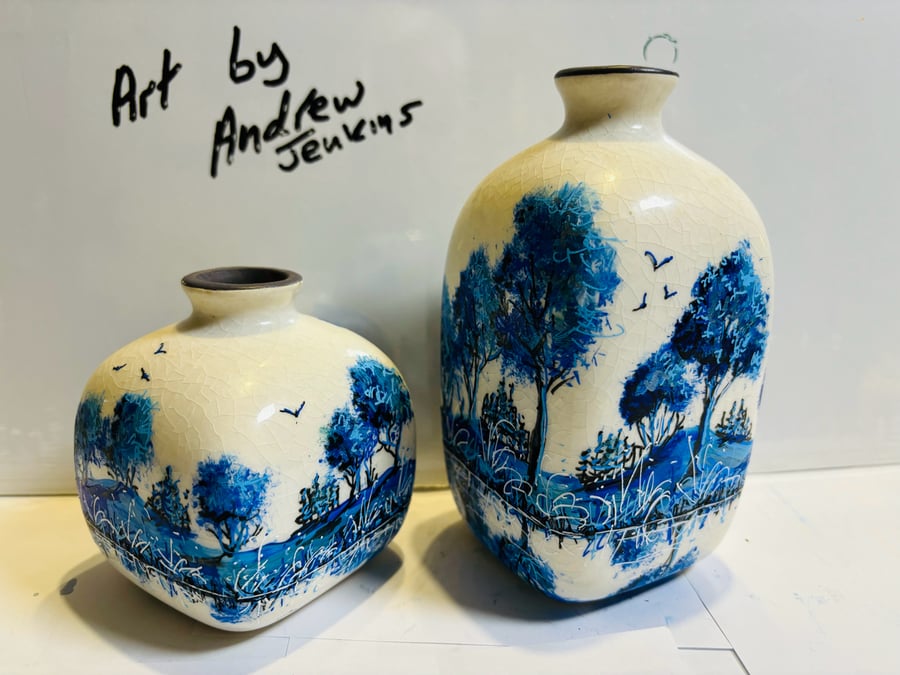 A hand painted and fired set of ceramic vases by Andrew Jenkins 