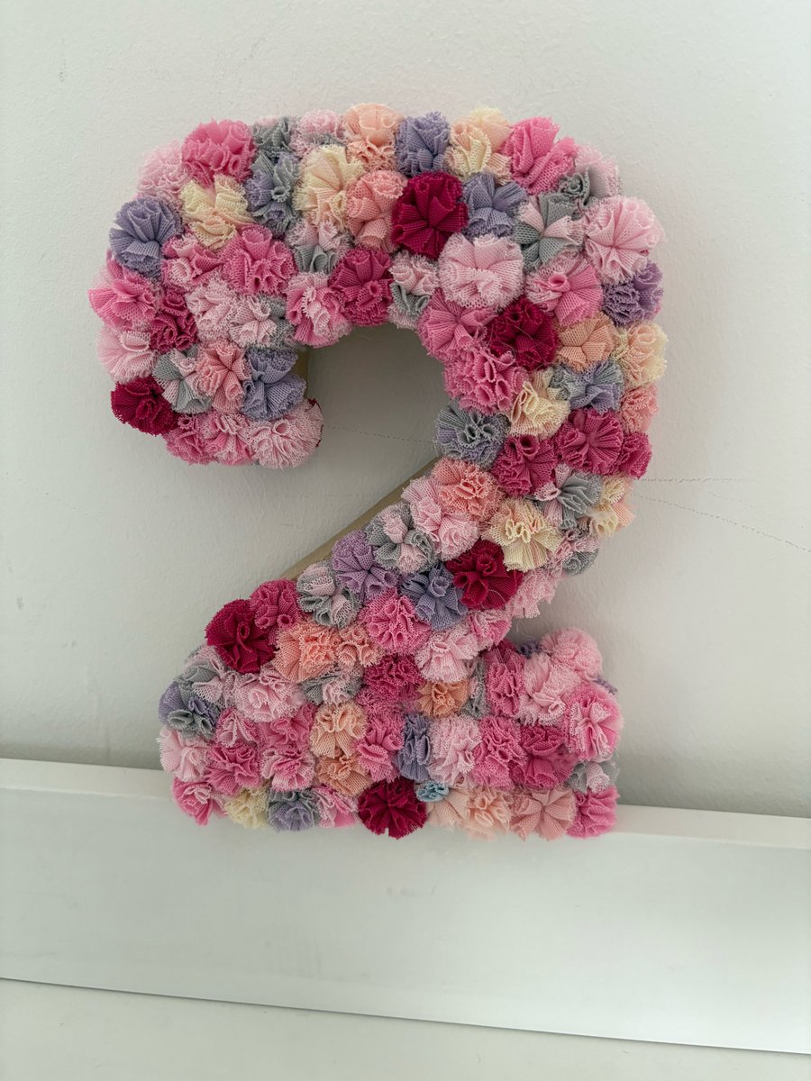No 2 scrunchy Pom Pom number. 