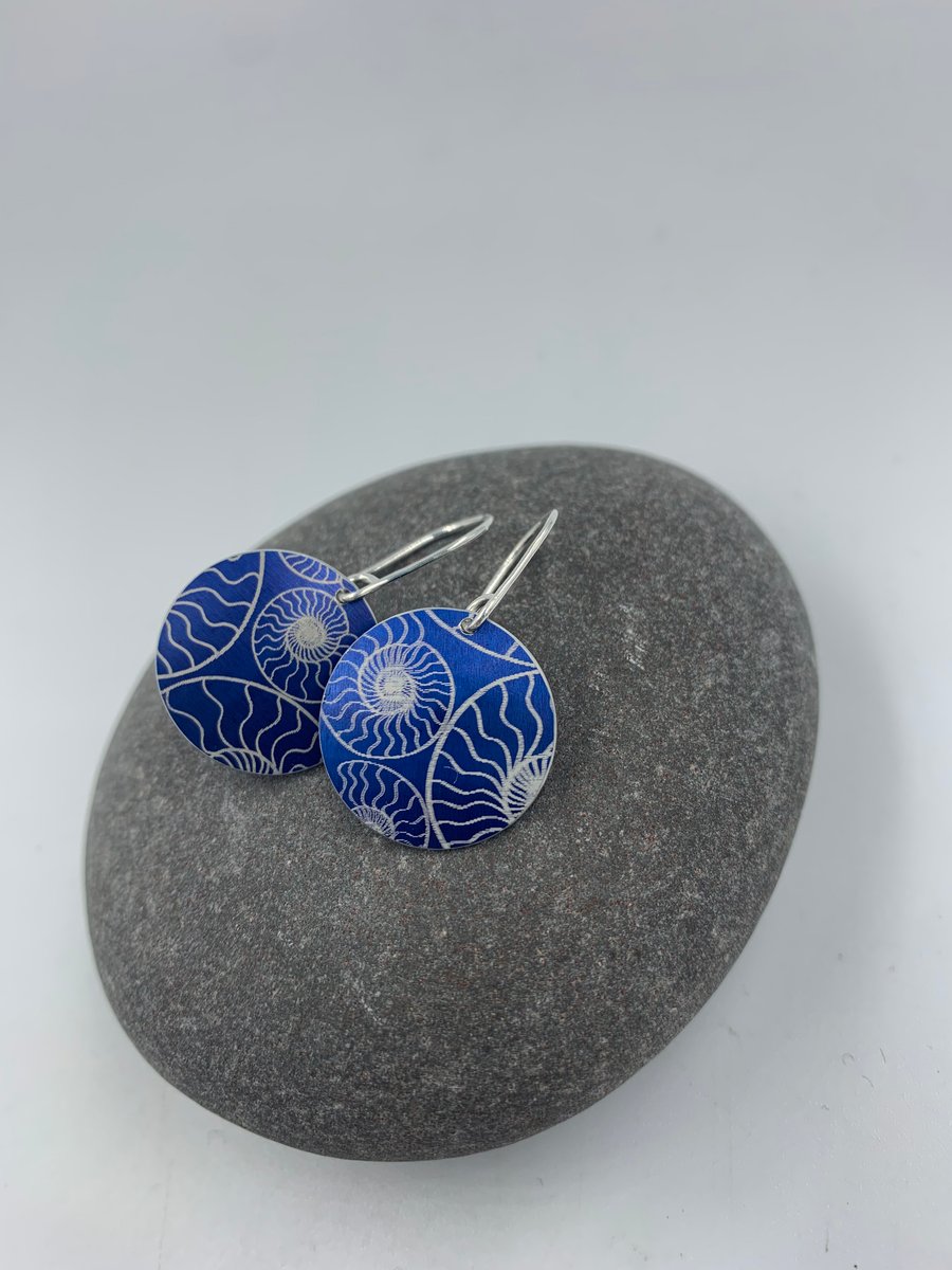 Dark blue anodised aluminium ammonite circle earrings