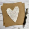 Up-cycled white and silver embroidered heart card. 