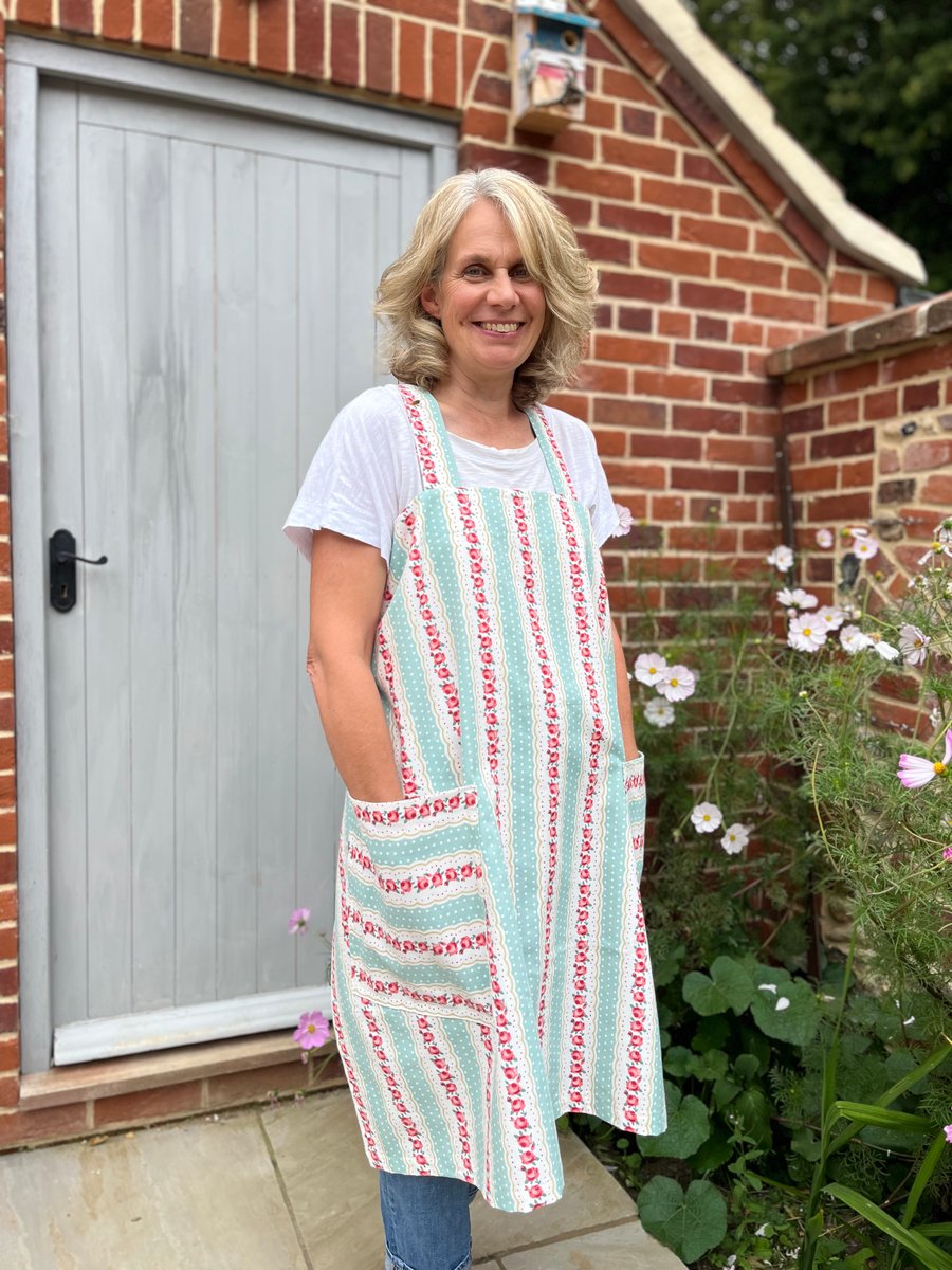 Cross back apron in vintage style floral stripe cotton