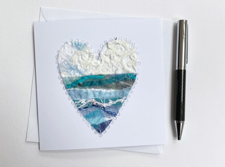 Up-cycled handmade fabric embroidered heart art card. 