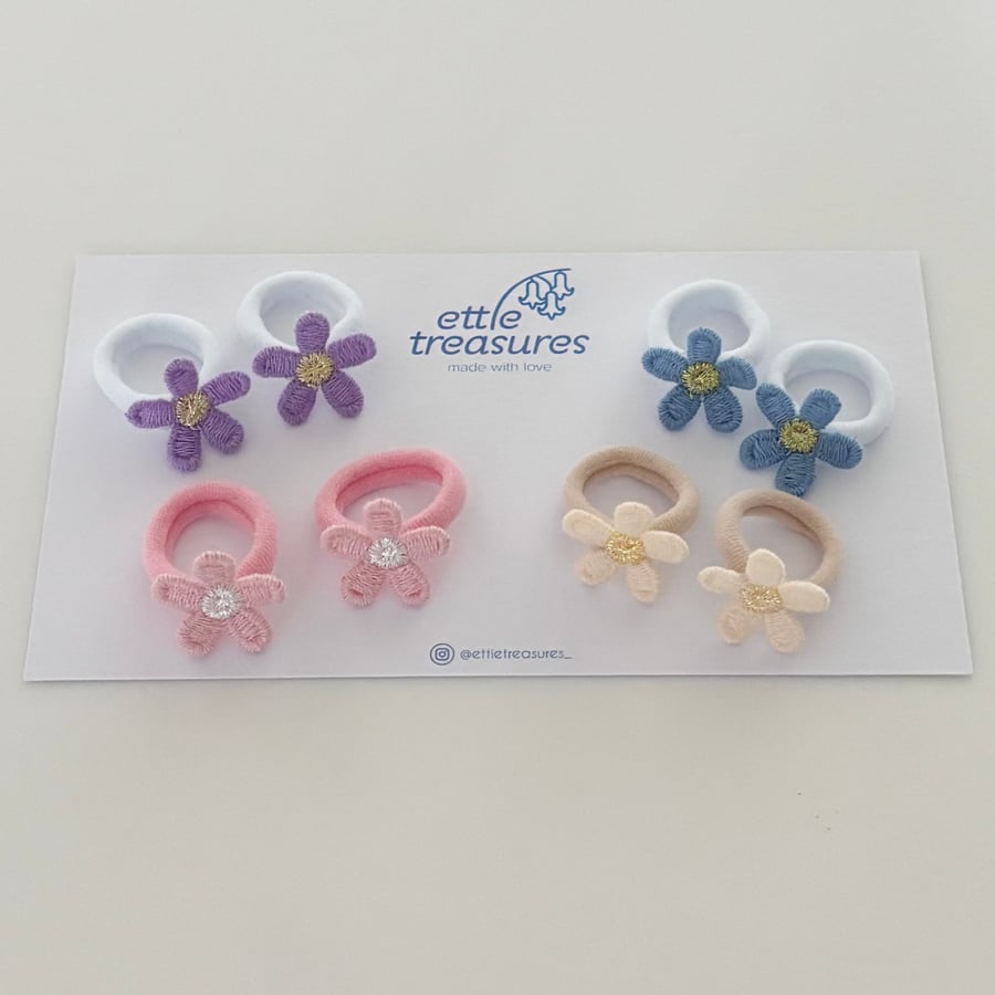 Set of eight mini sparkle flower Hair bobbles 