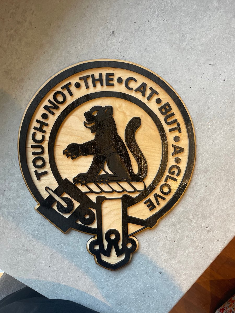 Family crest on wood