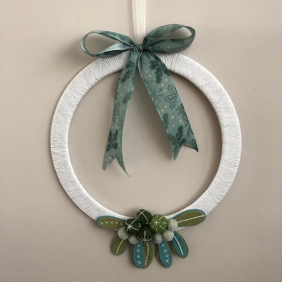 Handstitched felt mistletoe and berry Christmas wreath