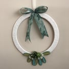 Handstitched felt mistletoe and berry Christmas wreath