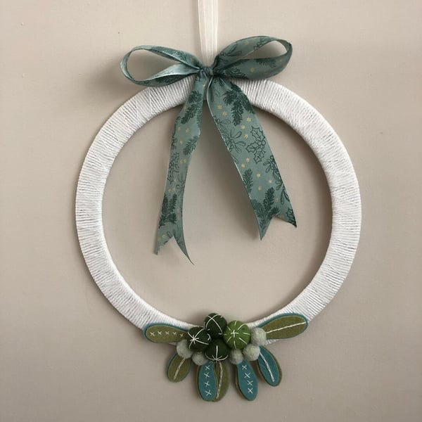 Handstitched felt mistletoe and berry Christmas wreath