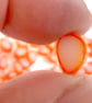 50g White with Orange edge petal murrini made with Bullseye 90coe glass - Image 3