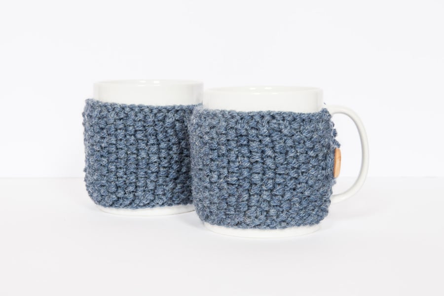 Pair of knitted mug cosies, cup cosy, coffee cosy in Denim Blue. Coffee mug cosy