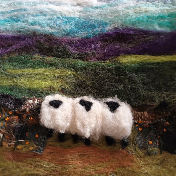 Sheep by a dry stonewall wool painting.  Needlefelt picture with hand embroidery