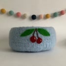 FELTED 'FUSSPOT' BOWL, desk tidy  . Blue, with cherry motif.