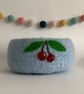 SALE ....FELTED 'FUSSPOT' BOWL, desk tidy  . Blue, with cherry motif.