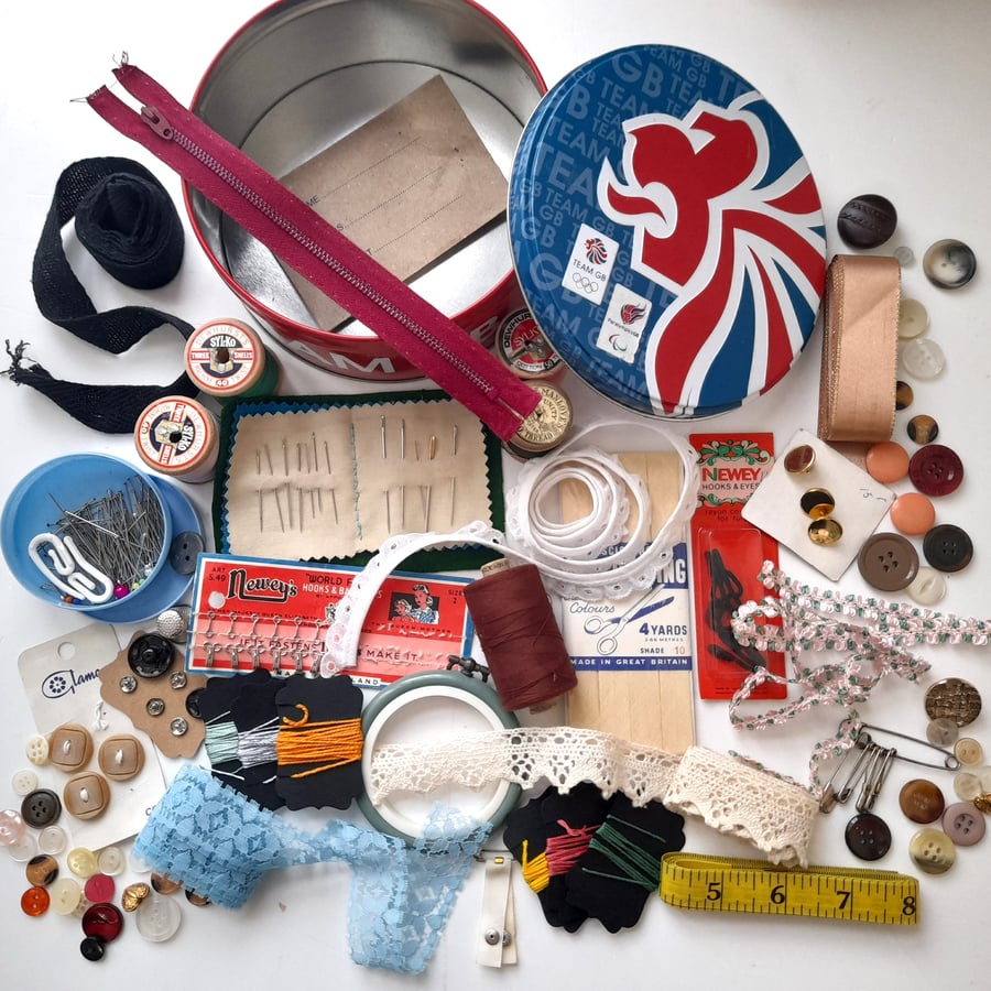 Vintage sewing haberdashery kit in an Olympics London 2012 tin