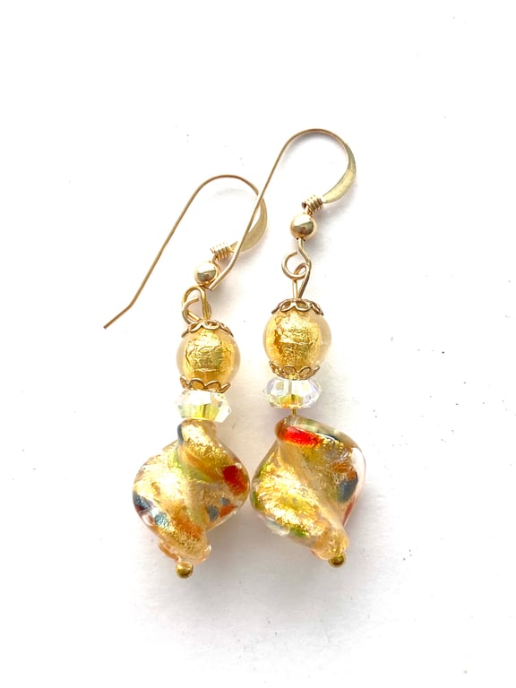 Murano glass gold twist earrings with Swarovski crystal and gold fill wires.
