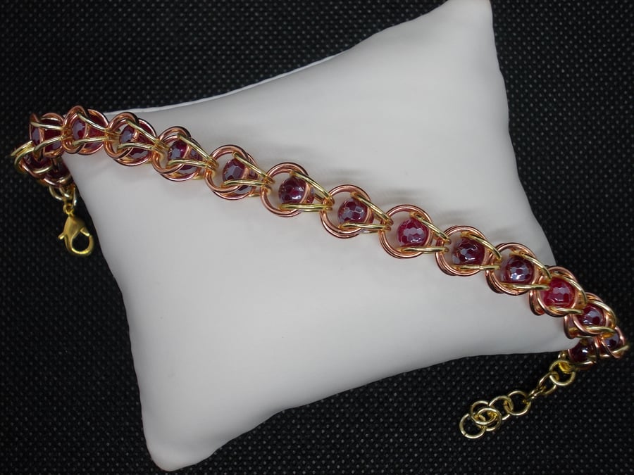 SALE - Coated red agate captured bead bracelet