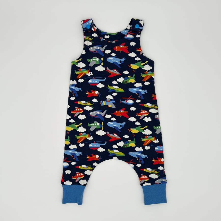 Handmade dungarees, Planes and helicopters print on a blue background