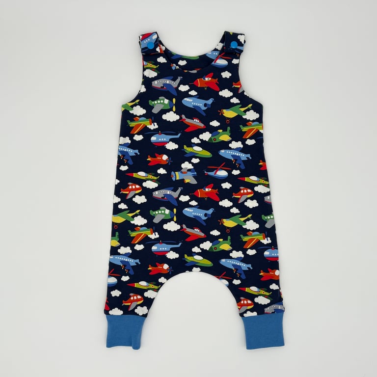 Handmade dungarees, Planes and helicopters print on a blue background