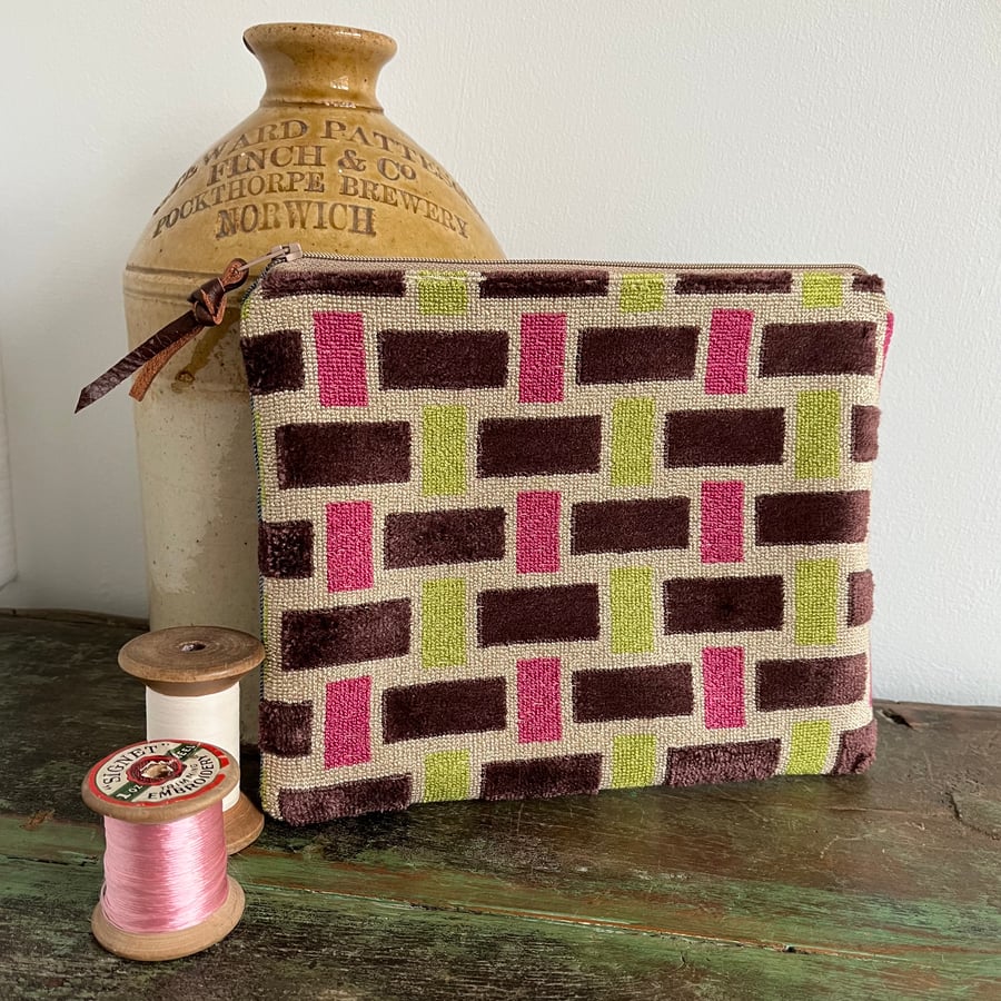 Textured fabric and reclaimed denim pouch