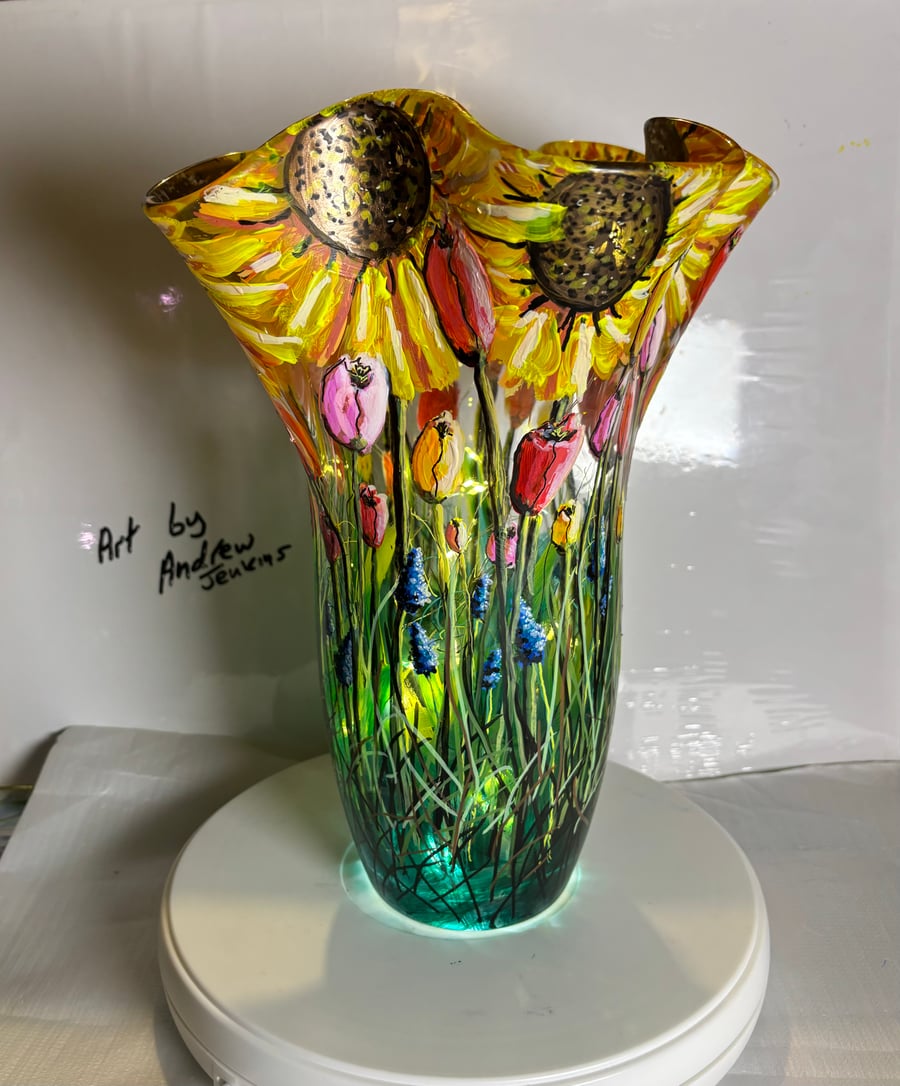 A large hand painted and fired fluted glass vase by Andrew Jenkins 