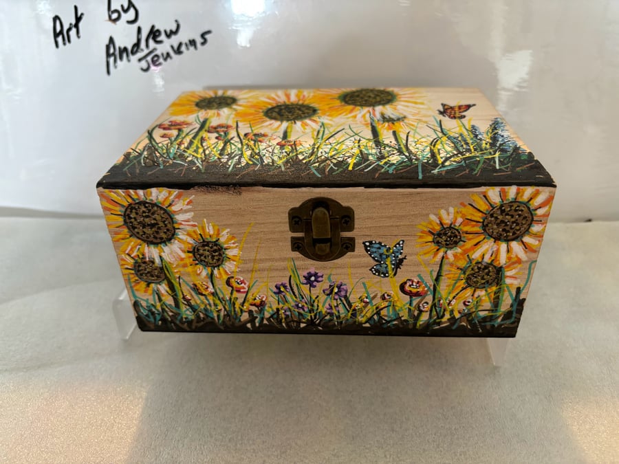 A hand painted and sealed wooden box by Andrew Jenkins 