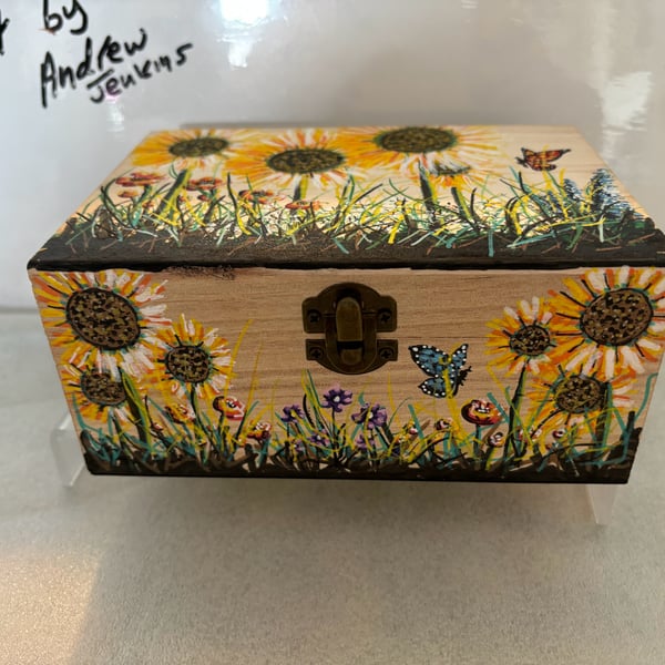 A hand painted and sealed wooden box by Andrew Jenkins 