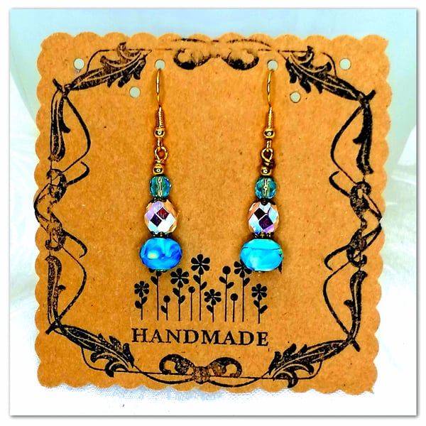 Handmade blue glass bead earrings with clear iridescent crystal beads
