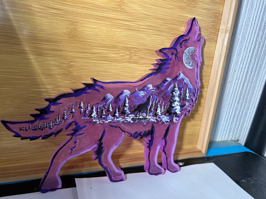 A hand painted and resin layered Winter Wolf piece by Andrew Jenkins 