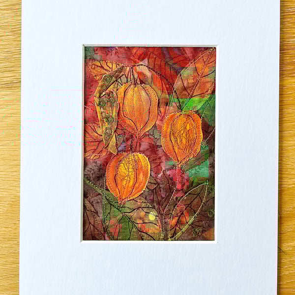 Textile picture with Chinese lantern flowers.